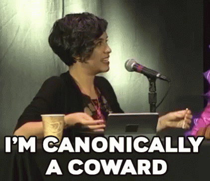 A Woman Is Sitting In Front Of A Microphone Holding A Cup Of Coffee And A Tablet . GIF