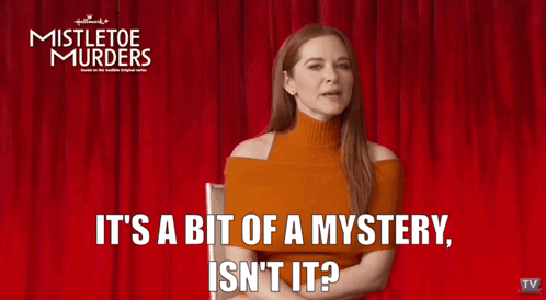 A Woman Is Sitting In Front Of A Red Curtain With Mistletoe Murders Written On It GIF
