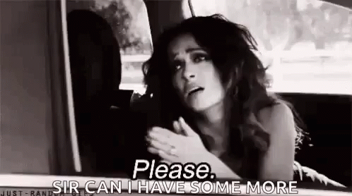 A Woman Is Sitting In The Back Seat Of A Car And Asking For Something . GIF