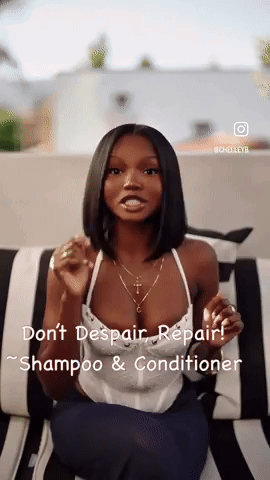 A Woman Is Sitting On A Black And White Striped Couch Talking About Shampoo And Conditioner . GIF