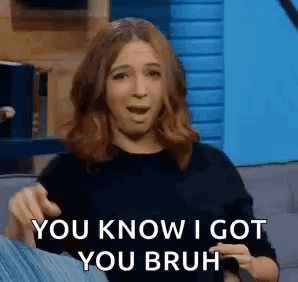 A Woman Is Sitting On A Couch And Saying `` You Know I Got You Bruh '' While Pointing At Herself . GIF