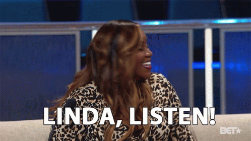 A Woman Is Sitting On A Couch And Says " Linda Listen " GIF