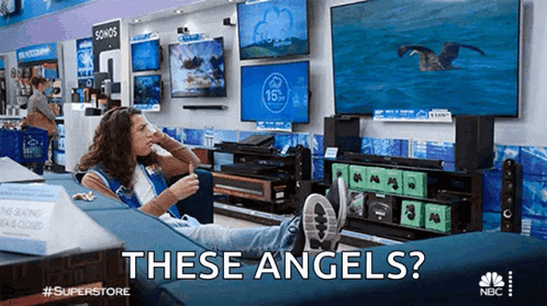 a woman is sitting on a couch in a store with the words " these angels " written above her