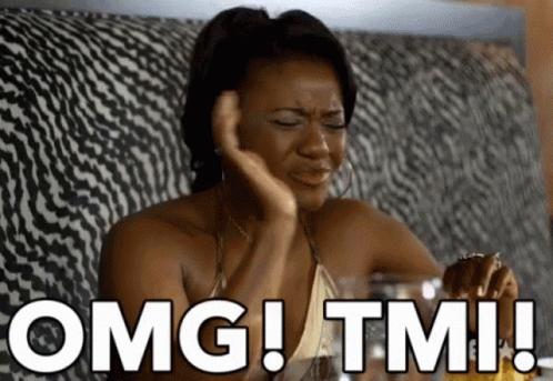 A Woman Is Sitting On A Couch With Her Hand On Her Face And The Words Omg Tmi Written In White GIF