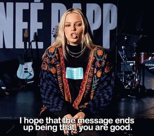A Woman Is Sitting On A Stage With The Words " I Hope That The Message Ends Up Being That You Are Good " GIF