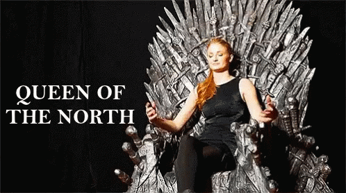 A Woman Is Sitting On A Throne With The Words Queen Of The North Behind Her GIF