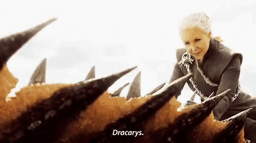 A Woman Is Sitting On The Back Of A Dragon . GIF