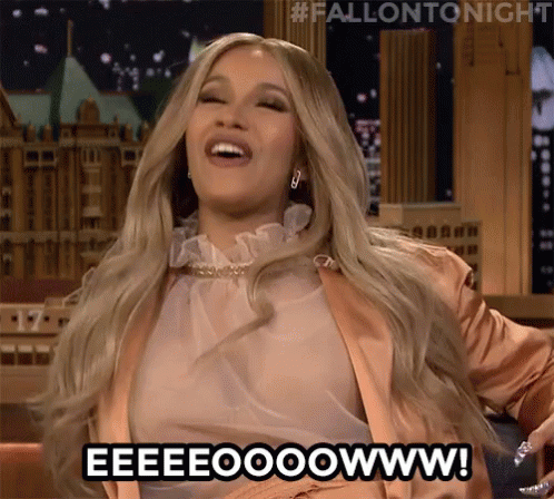 A Woman Is Smiling And Saying Eeeeooowww . GIF