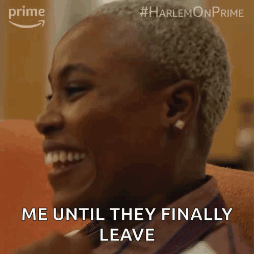 A Woman Is Smiling And Says Me Until They Finally Leave . GIF