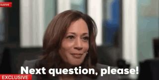 A Woman Is Smiling And Says Next Question Please ! GIF