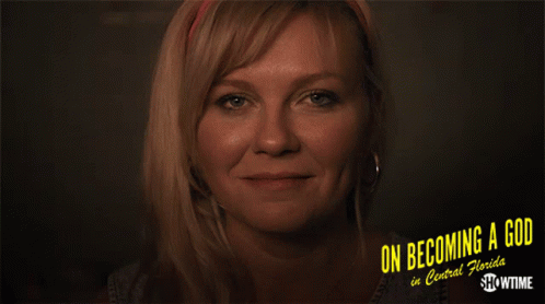 A Woman Is Smiling In A Showtime Ad For On Becoming A God In Central Florida GIF