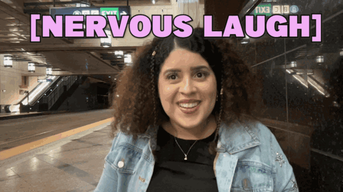 A Woman Is Smiling In Front Of A Sign That Says [ Nervous Laugh ] GIF