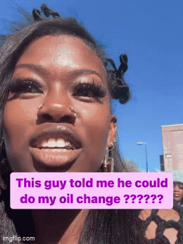 A Woman Is Smiling With A Caption That Says " This Guy Told Me He Could Do My Oil Change ?? " GIF