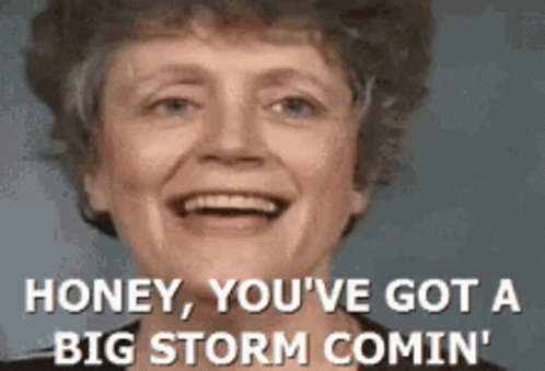 A Woman Is Smiling With The Words Honey You 'Ve Got A Big Storm Comin ' GIF
