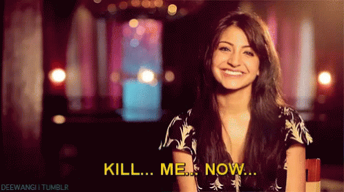 A Woman Is Smiling With The Words Kill Me Now Below Her GIF