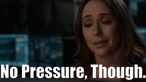 A Woman Is Smiling With The Words No Pressure Though Behind Her GIF