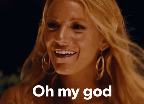 A Woman Is Smiling With The Words Oh My God Written Below Her GIF