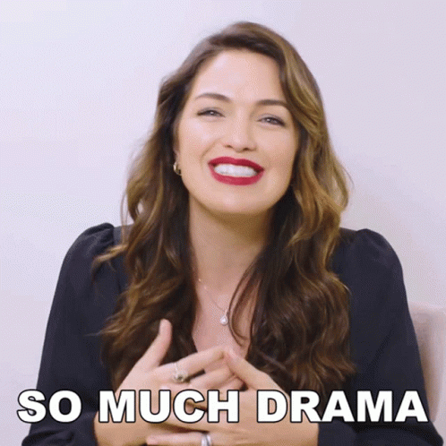 A Woman Is Smiling With The Words So Much Drama Written Below Her GIF