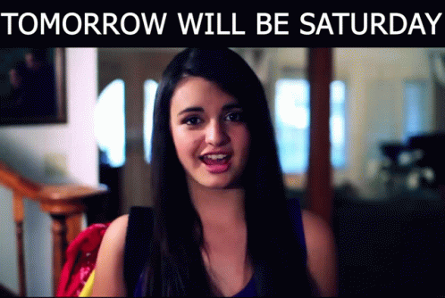 A Woman Is Smiling With The Words Tomorrow Will Be Saturday Below Her GIF
