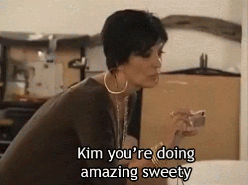 A Woman Is Smoking A Cigarette And Saying `` Kim You 'Re Doing Amazing Sweety '' GIF