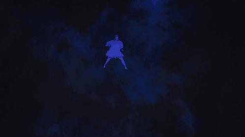 A Woman Is Standing In A Cage With A Purple Light Behind Her GIF