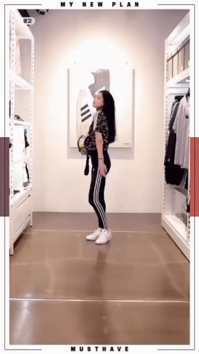 A Woman Is Standing In A Closet With The Words My New Plan Must Have On The Bottom GIF