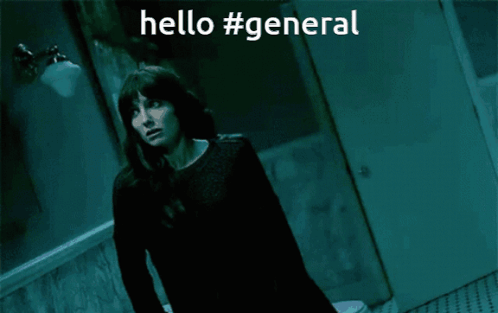 A Woman Is Standing In A Dark Room With The Words Hello #General Written Above Her GIF