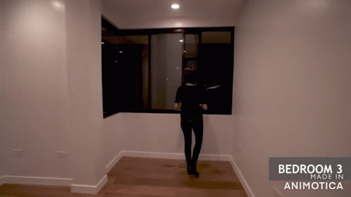 A Woman Is Standing In A Room With The Words Bedroom 3 Made In Animotica On The Bottom GIF