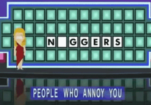 A Woman Is Standing In Front Of A Board That Says Niggers GIF