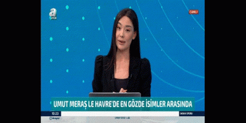 Woman Standing In Front Of Laptop On TV Screen GIF