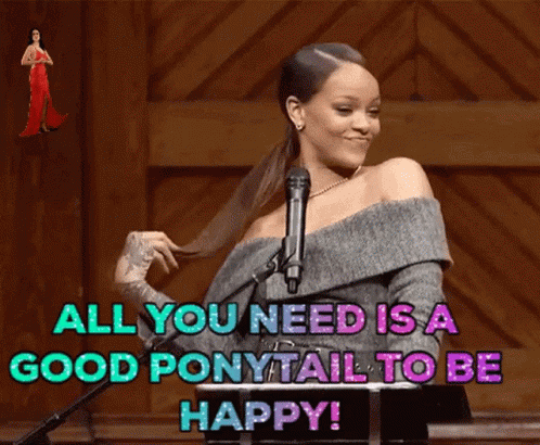 A Woman Is Standing In Front Of A Microphone With The Words " All You Need Is A Good Ponytail To Be Happy " GIF