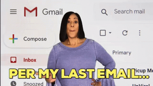 A Woman Is Standing In Front Of A Screen That Says Gmail On It GIF