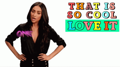 A Woman Is Standing In Front Of A Sign That Says That Is So Cool Love It Omg GIF