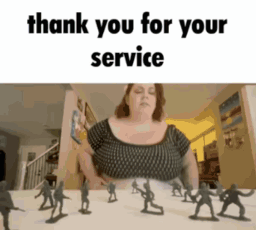 A Woman Is Standing In Front Of A Table Full Of Toy Soldiers And The Words Thank You For Your Service GIF