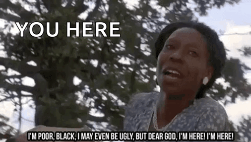 A Woman Is Standing In Front Of A Tree And Says You Here . GIF