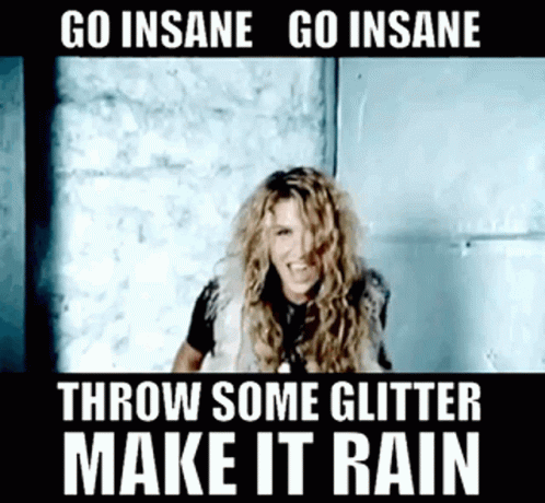 A Woman Is Standing In Front Of A Wall With A Caption That Says Go Insane Go Insane Throw Some Glitter Make It Rain . GIF