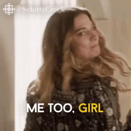 A Woman Is Standing In Front Of A Window With Her Hair Blowing In The Wind And Saying `` Me Too , Girl '' . GIF