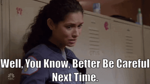 A Woman Is Standing In Front Of Lockers With The Words Well You Know Better Be Careful Next Time GIF