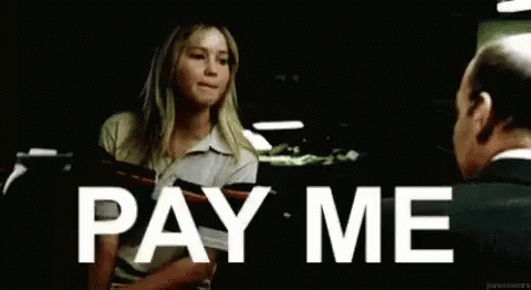 Woman Next To Man Holding Paper Says Pay Me GIF