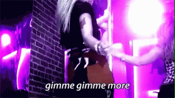 Woman Standing On Pole With Gimme Gimme More GIF