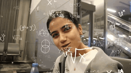 A Woman Is Surrounded By Mathematical Equations Including The Letters X And Y GIF