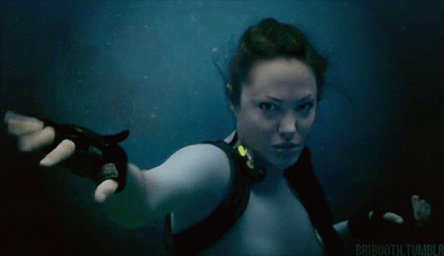 a woman is swimming underwater with the words bridooth.tumblr written on the bottom