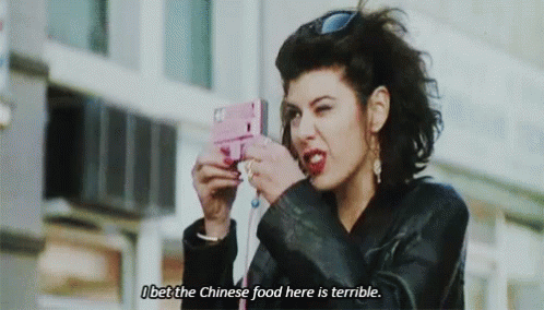 A Woman Is Taking A Picture Of Herself With A Cell Phone And Says I Bet The Chinese Food Here Is Terrible GIF