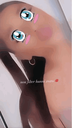 A Woman Is Taking A Selfie With A Cartoon Face On Her Face And The Caption Says Non Filter Hunni Xoxo GIF