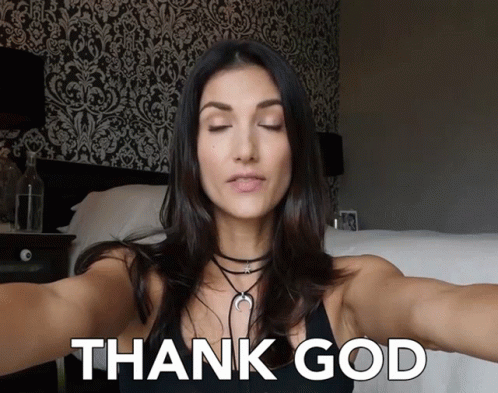 A Woman Is Taking A Selfie With The Words Thank God Behind Her GIF