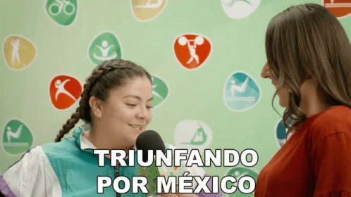 A Woman Is Talking Into A Microphone And The Words Triunfando Por Mexico Are On The Bottom GIF