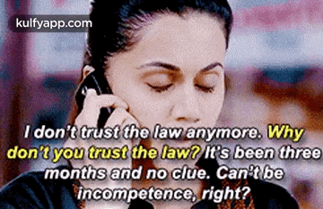 A Woman Is Talking On A Cell Phone And Says `` I Don T Trust The Law Anymore . '' GIF