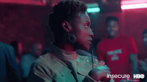 A Woman Is Talking On A Cell Phone And The Word Awkward Is On The Screen GIF