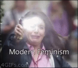 A Woman Is Talking On A Cell Phone And The Words Modern Feminism Are Visible GIF
