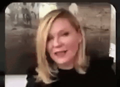 A Woman Is Talking On A Video Call While Wearing A Black Top . GIF